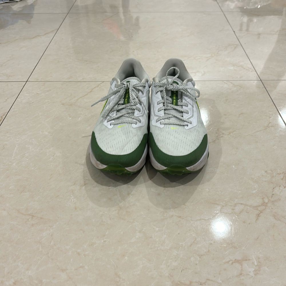 Green Nike golf shoes